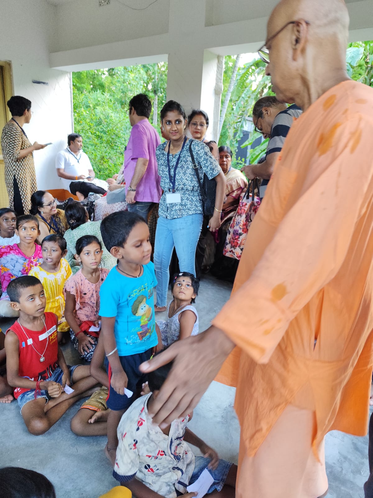 Children and community members during service activity